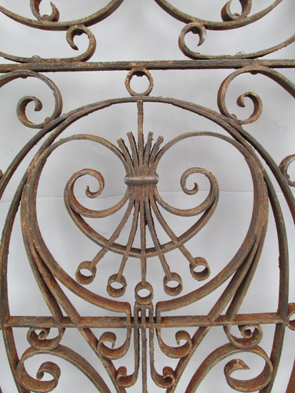Two Ornate Iron Grills