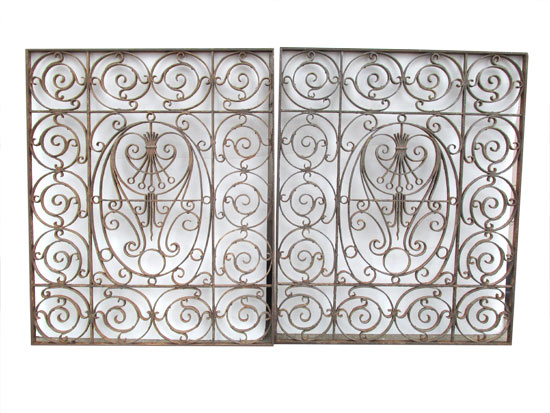 Two Ornate Iron Grills