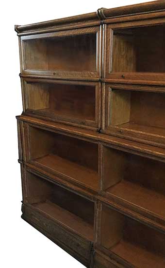 Pair of Oak Four Stack, Step-Back Bookcases