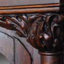 Intricate Carved Oak China Cabinet with Face