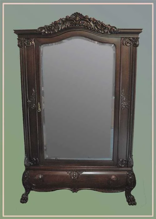 Horner armoire carved beveled glass