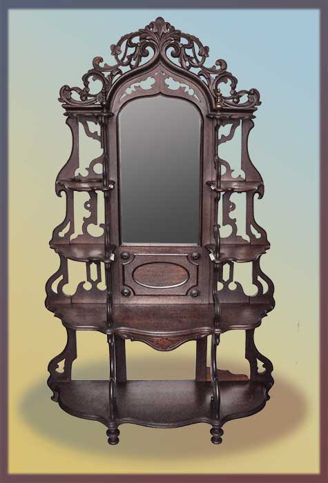 wooden etagere with shaped mirror