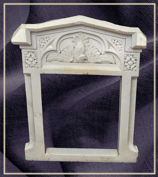 carved marble frame birds