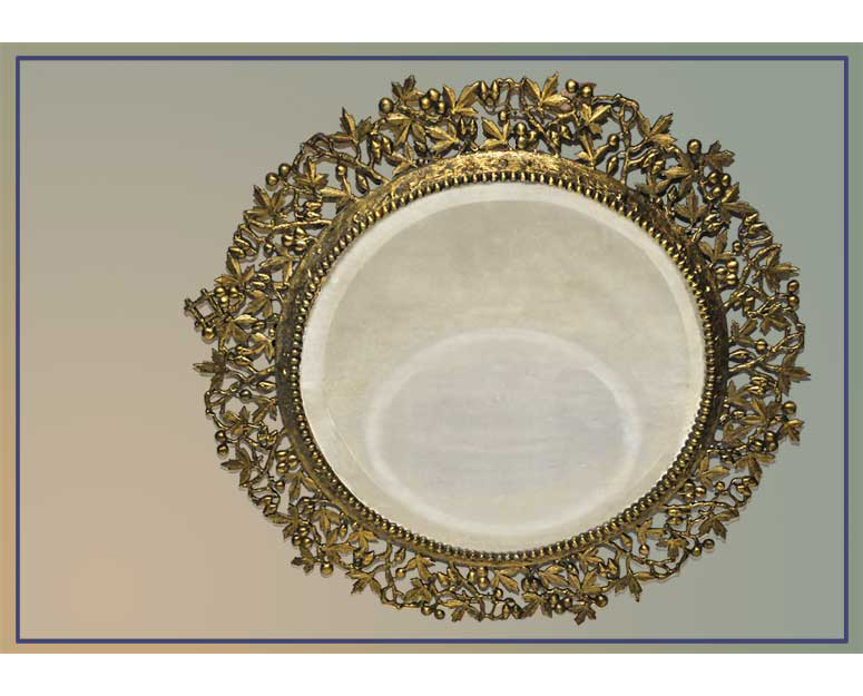 Decorative round brass mirror