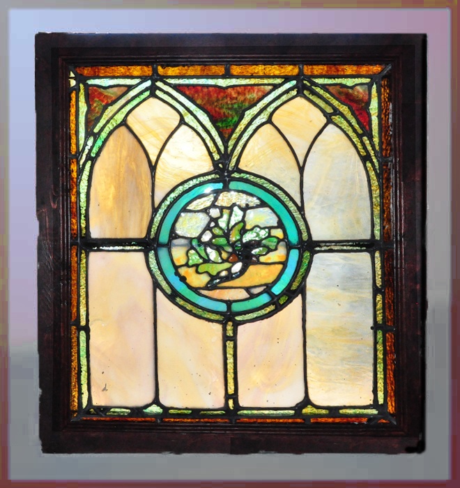 church window with oak leaves symbol