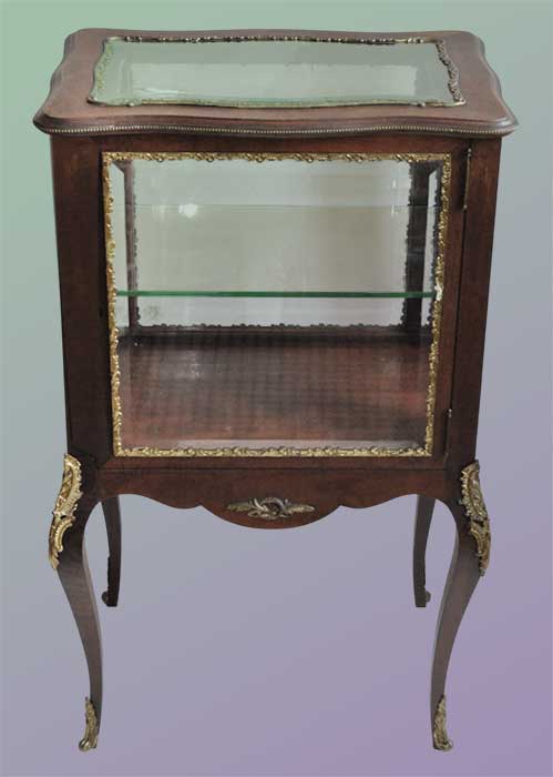 small shaped curio cabinet with ormolu