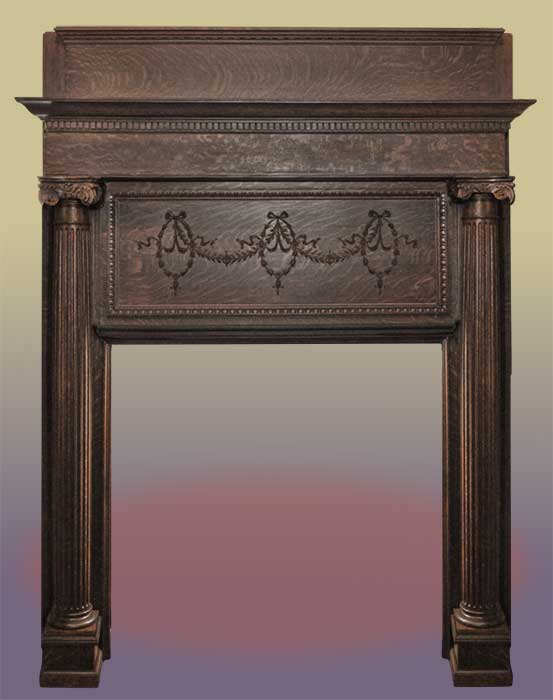 3/4 carved oak mantel with garland and columns