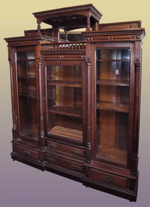 three-door carved mahogany bookcase