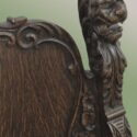 Shaped Oak Armchair, with Decorative Lions