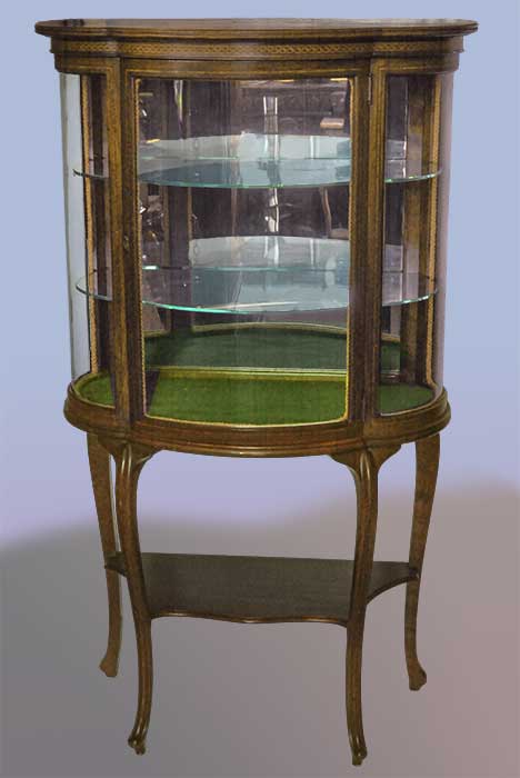 small shaped French curio cabinet