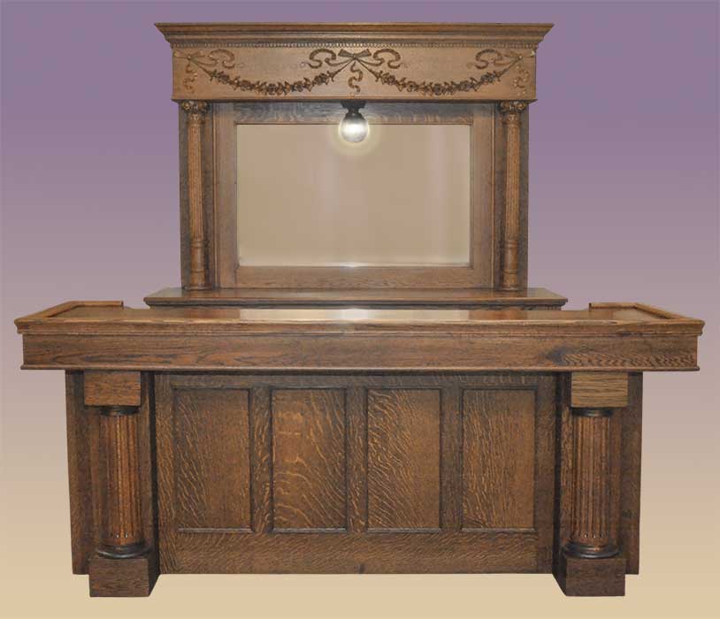custom carved oak front and back home bar