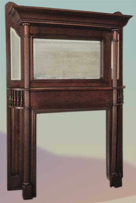 full oak mantel with three mirrors and columns
