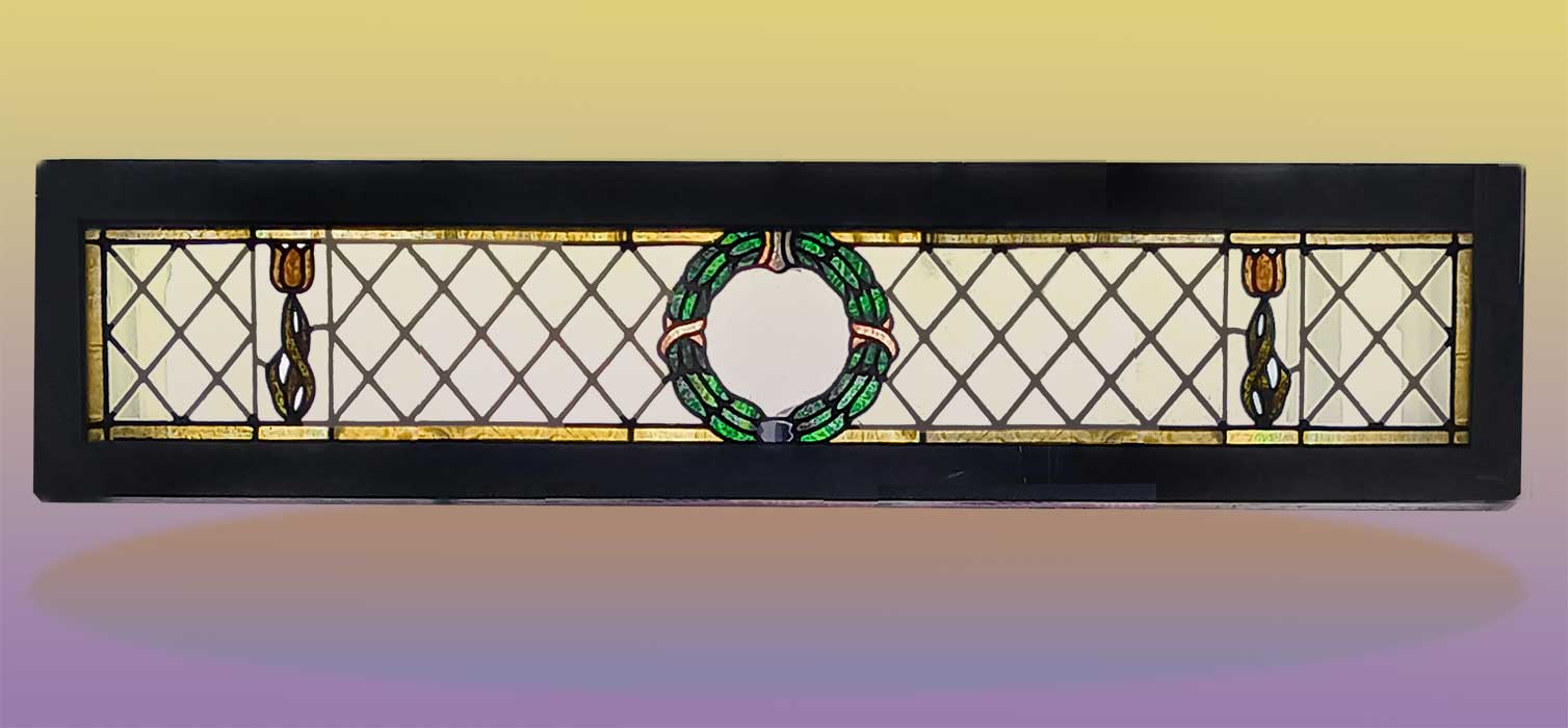 stained glass transom with wreath and flowers