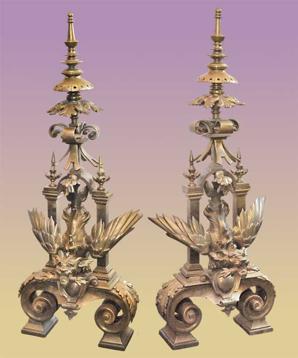 pair of brass griffin andirons