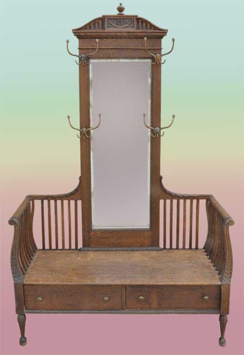 carved hall tree and bench with railing
